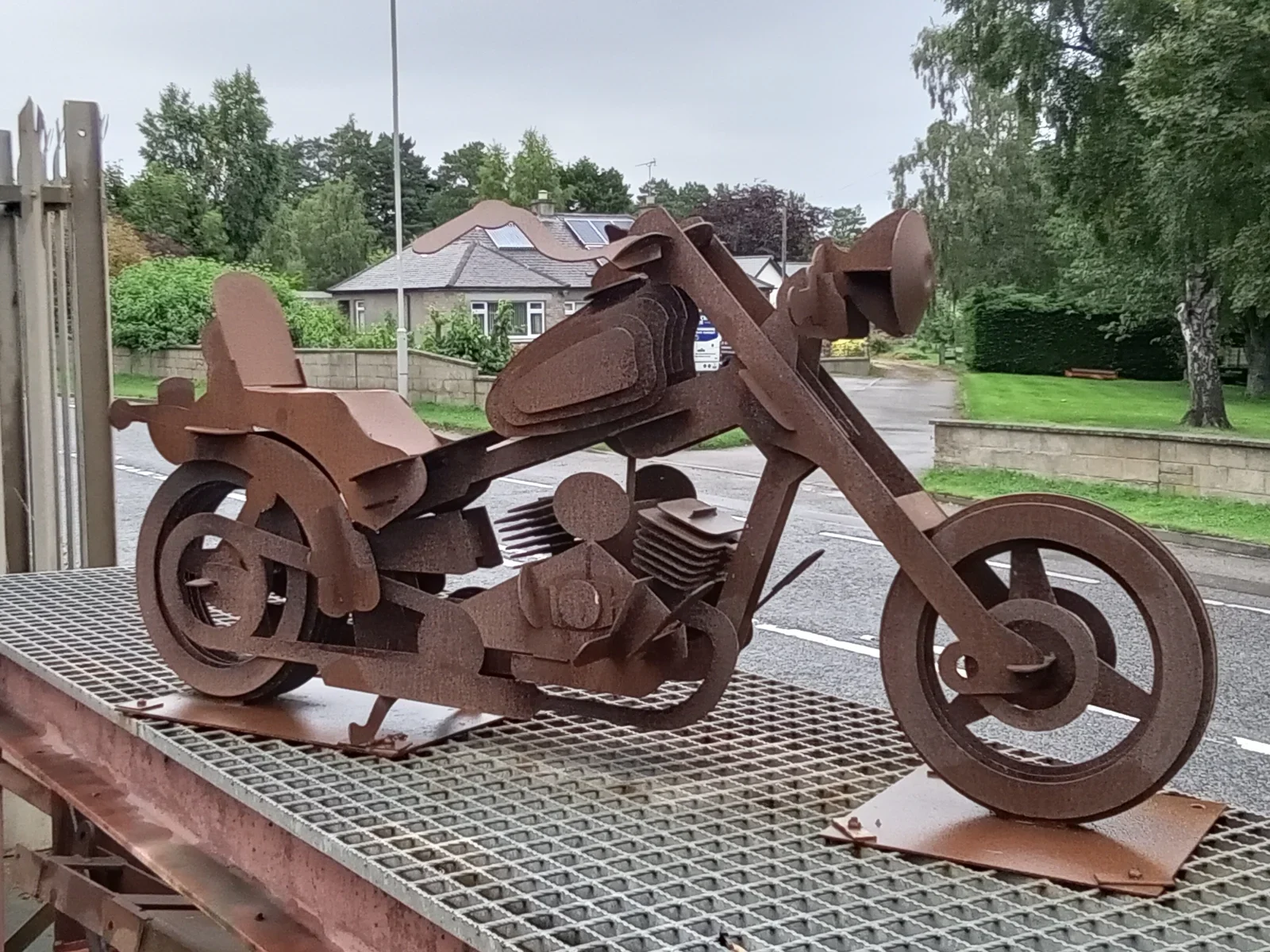 Aged motorbike sculpture