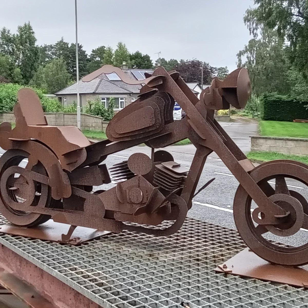 Aged motorbike sculpture