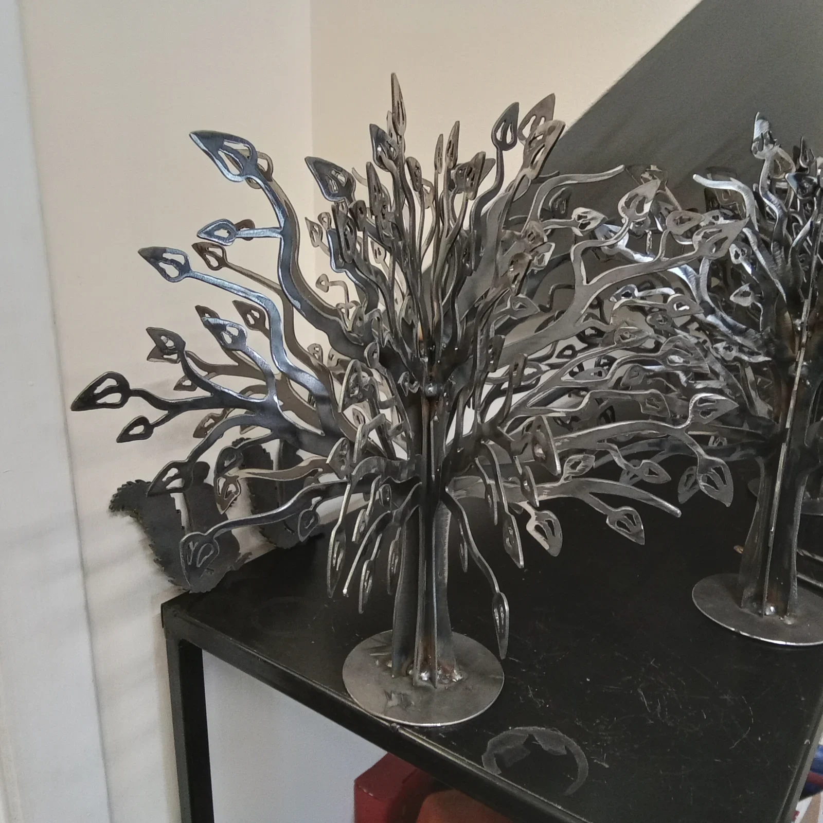 A forest of leafy steel trees