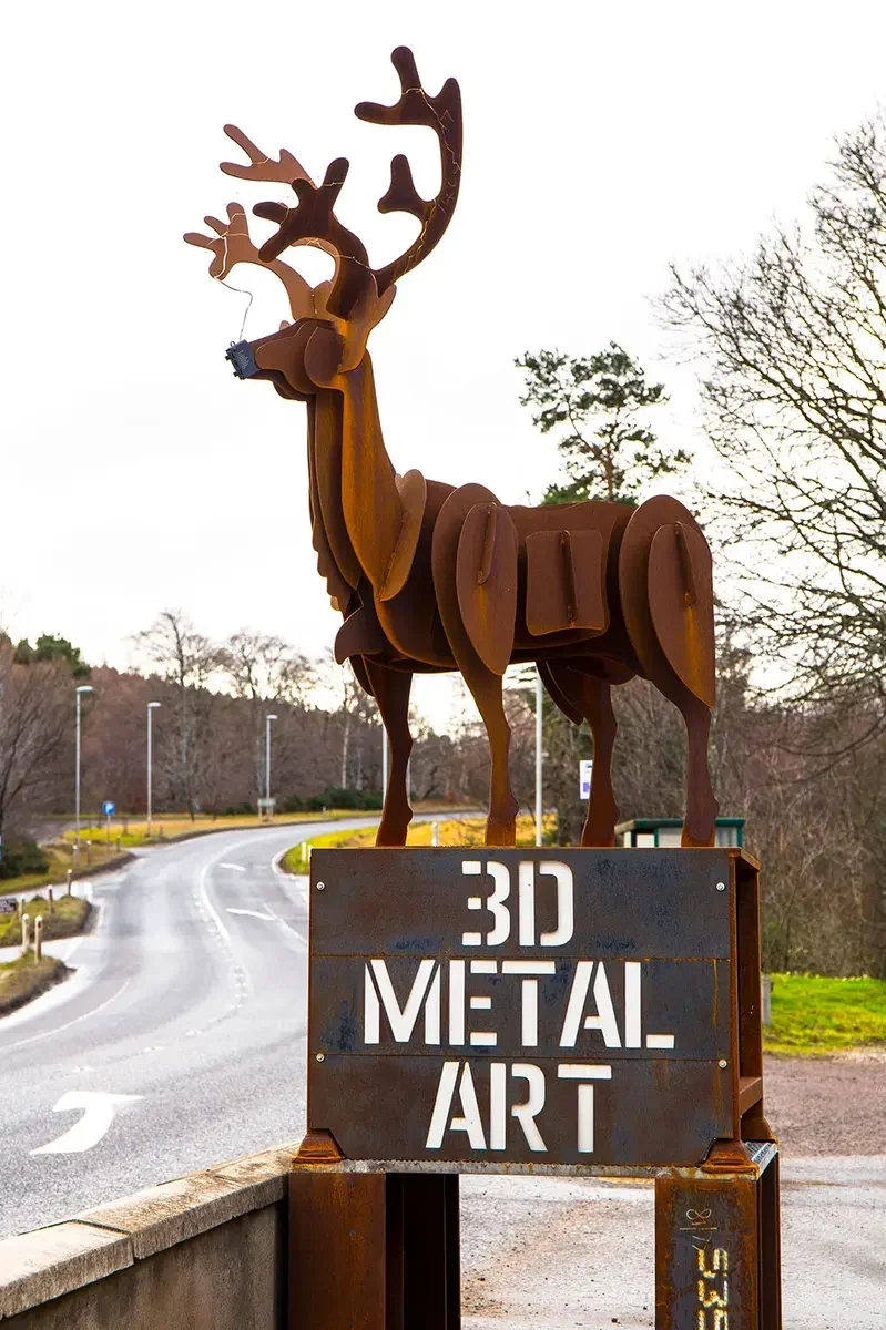 Large layered aged steel stag sculpture